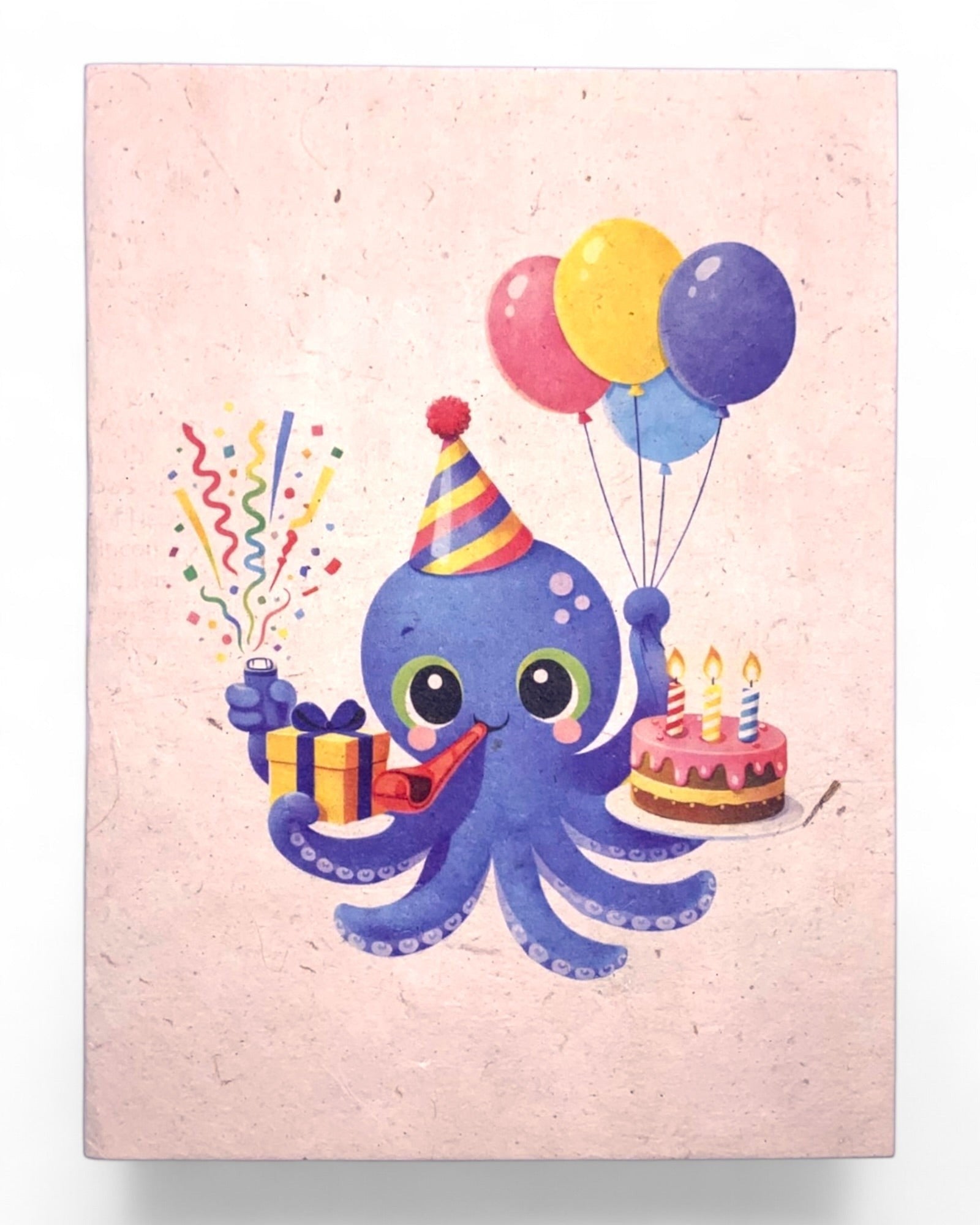 Lokta Cards blue octopus wearing a party hat, holding a gift and cake, with balloons and confetti. Birthday card.